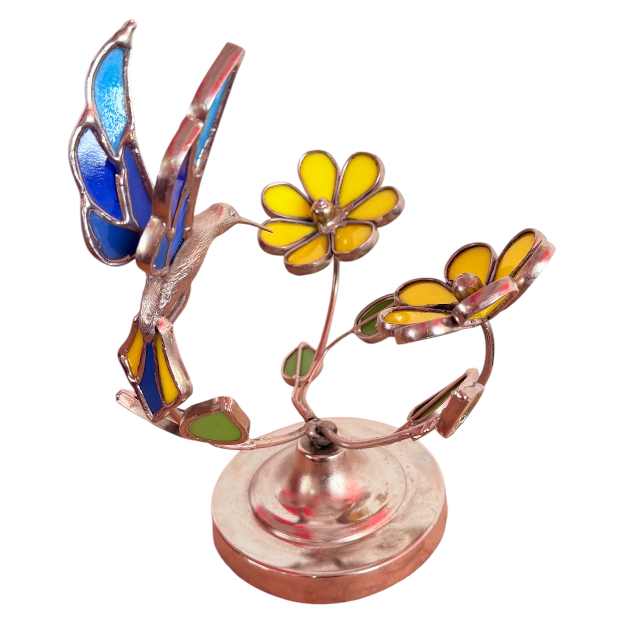 Colibrí de mesa con dos flores